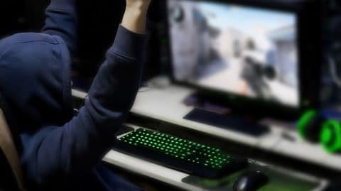 Person-Playing-Video-Game-Getting-Caught-With-Hands-Up
