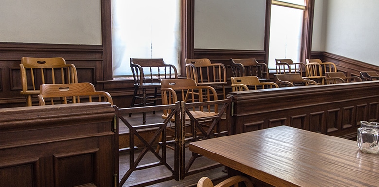 Empty jury stand in court room