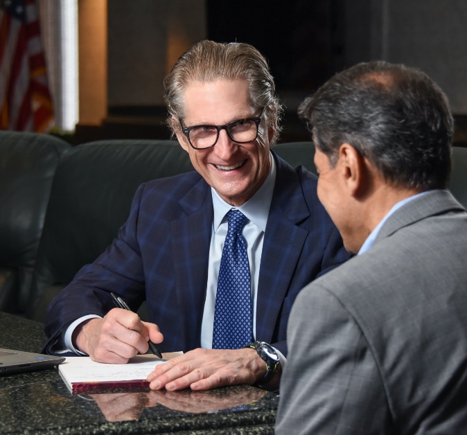 Houston criminal defense attorney Ned Barnett with a client
