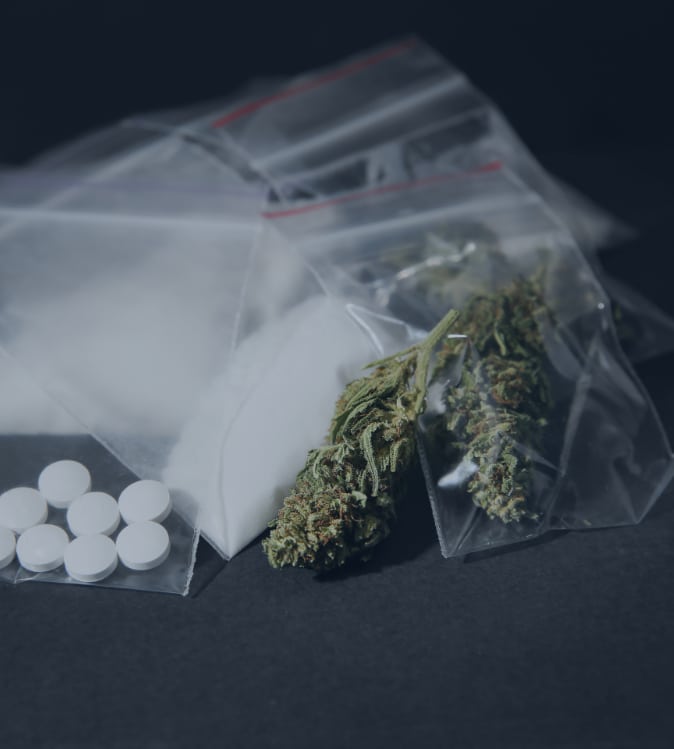 selection of illegal drugs in plastic bags